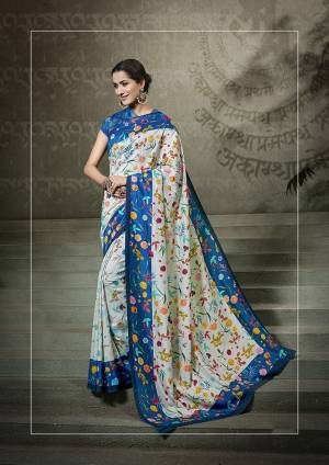 Go Colorful With This Multi Colored Saree Paired With Blue Colored Blouse. This Saree And Blouse Are Fabricated On Tussar Art Silk Beautified With Digital Prints All Over It. 