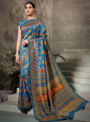 This Festive Season, Go Traditional Wearing This Printed Saree In Blue Color Paired With Blue Colored Blouse. This Saree And Blouse Are Fabricated On Tussar Art Silk Beautified With Digital Prints All over. Buy Now. 