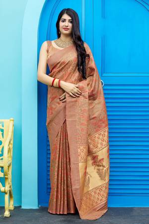 Celebrate This Festive Season With Beauty And Comfort In This Elegant Looking Designer Silk Based Saree In Light Brown Color. This Saree And Blouse Are Fabricated On Art Silk Beautified With Small Butti Weave All Over. Buy Now.?