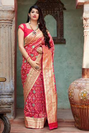 Celebrate This Festive Season With Beauty And Comfort In This Elegant Looking Designer Silk Based Saree In Dark Pink Color. This Saree And Blouse Are Fabricated On Banarasi Tissue Patola Beautified With Small Butti Weave All Over. Buy Now.?