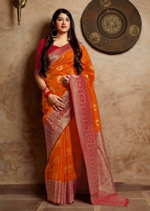 Celebrate This Festive Season With Beauty And Comfort In This Elegant Looking Designer Silk Based Saree In Orange Color. This Saree And Blouse Are Fabricated On Banarasi Art Silk Beautified With Small Butti Weave All Over. Buy Now.?