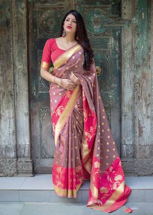 Flaunt Your Rich And Elegant Taste In Silk With This Subtle Weaved Saree In Mauve Color. This Saree And Blouse Are Fabricated On Art Silk Beautified With Pretty Small Butti Weave All Over It. Its Silk Based Fabric Will Give A Rich Look To Your Personality