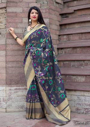 Celebrate This Festive Season With Beauty And Comfort In This Elegant Looking Designer Silk Based Saree In Navy Blue Color. This Saree And Blouse Are Fabricated On Art Silk Beautified With Small Butti Weave All Over. Buy Now.?