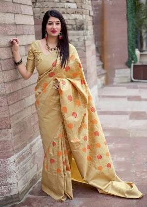 Flaunt Your Rich And Elegant Taste In Silk With This Subtle Weaved Saree In Cream Color. This Saree And Blouse Are Fabricated On Art Silk Beautified With Pretty Small Butti Weave All Over It. Its Silk Based Fabric Will Give A Rich Look To Your Personality