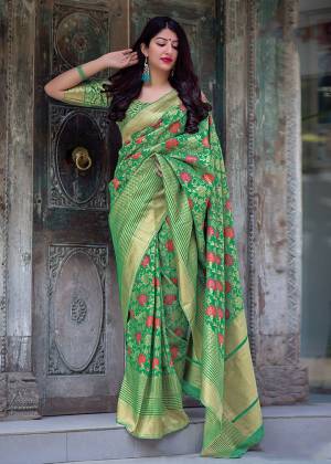 Celebrate This Festive Season With Beauty And Comfort In This Elegant Looking Designer Silk Based Saree In Green Color. This Saree And Blouse Are Fabricated On Art Silk Beautified With Small Butti Weave All Over. Buy Now.?