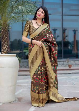 Flaunt Your Rich And Elegant Taste In Silk With This Subtle Weaved Saree In Brown Color. This Saree And Blouse Are Fabricated On Art Silk Beautified With Pretty Small Butti Weave All Over It. Its Silk Based Fabric Will Give A Rich Look To Your Personality