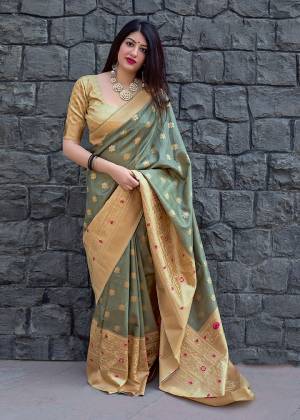 Celebrate This Festive Season With Beauty And Comfort In This Elegant Looking Designer Silk Based Saree In Grey Color. This Saree And Blouse Are Fabricated On Art Silk Beautified With Small Butti Weave All Over. Buy Now.?