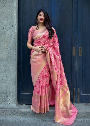 Celebrate This Festive Season With Beauty And Comfort In This Elegant Looking Designer Silk Based Saree In Pink Color. This Saree And Blouse Are Fabricated On Art Silk Beautified With Small Butti Weave All Over. Buy Now.?
