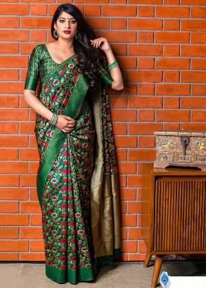 Celebrate This Festive Season With Beauty And Comfort In This Elegant Looking Designer Silk Based Saree In Dark Green Color. This Saree And Blouse Are Fabricated On Banarasi Art Silk Beautified With Small Butti Weave All Over. Buy Now.?