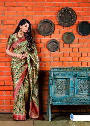 Flaunt Your Rich And Elegant Taste In Silk With This Subtle Weaved Saree In Golden Color. This Saree And Blouse Are Fabricated On Banarasi Art Silk Beautified With Pretty Small Butti Weave All Over It. Its Silk Based Fabric Will Give A Rich Look To Your Personality