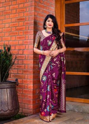 Flaunt Your Rich And Elegant Taste In Silk With This Subtle Weaved Saree In Magenta Pink Color. This Saree And Blouse Are Fabricated On Banarasi Art Silk Beautified With Pretty Small Butti Weave All Over It. Its Silk Based Fabric Will Give A Rich Look To Your Personality