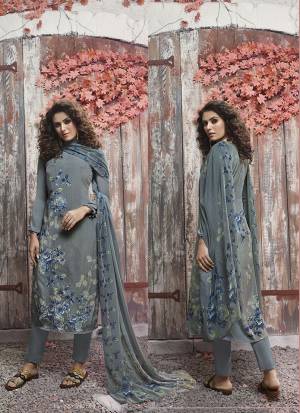 Flaunt Your Rich And Elegant Taste Wearing This Designer Dress Material In Grey Color. This Pretty Digital Printed Dress Material Is Fabricated On Crepe Paired With Georgette Fabricated Dupatta. Buy Now.
