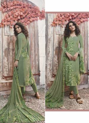 This Festive Season, Look The Most Elegant Of All Wearing This Designer Digital Printed Suit In Light Green Color. This Dress Material Is Fabricated On Crepe Paired With Georgette Fabricated Dupatta. It Is Beautified With Digital Prints All Over. 