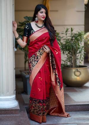 Celebrate This Festive Season With Beauty And Comfort In This Elegant Looking Designer Silk Based Saree In Red And Black Color. This Saree And Blouse Are Fabricated On Banarasi Art Silk Beautified With Small Butti Weave All Over. Buy Now.