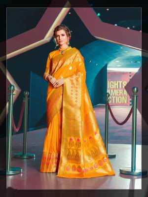 Celebrate This Festive Season With Some Bright Colors And Traditional Silk Fabric In This Designer Musturd Yellow Colored Silk based Saree Beautified With Weave. 