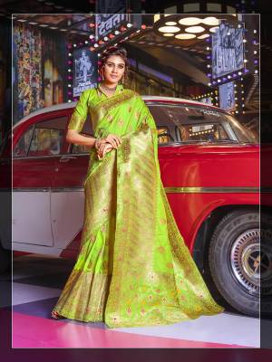Bright And Visually Appealing Shade Is Here With This Very Beautiful Designer Saree In Parrot Green Color. This Saree And Blouse Are Fabricated On Art Silk Beautified With Weave All Over. Buy Now.