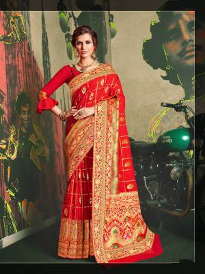 Adorn The Proper Traditional Look Wearing This Designer Silk Based Saree In Red Color Paired With Red Colored Blouse. It Is Beautified With Pretty Attractive Weave All Over. 