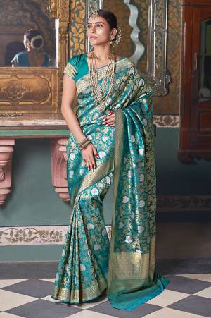 Add This Very Pretty Designer Saree To Your Wardrobe In Blue Color. This Saree And Blouse are Fabricated On Art Silk Which Is Light Weight, Durable And Easy To Carry All Day Long. 