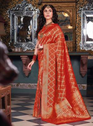 Adorn The Pretty Angelic Look In Red Wearing This Designer Saree In Red Color. This Saree And Blouse Are Silk Based Which Gives A Rich Look To Your Personality. 
