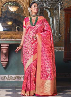Bright And Visually Appealing Shade Is Here With This Designer Saree In Rani Pink Color Paired With Rani Pink Colored Blouse. This Saree And Blouse Are fabricated On Art Silk Beautified With Intricate Weave All Over. 