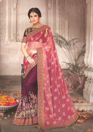 Pretty In Pink , Grab This Heavy Designer Saree In Pink And Magenta Pink Color Paired With Magenta Pink Colored Blouse. This Saree Is Fabricated On Net And Art Silk Paired With Art Silk Fabricated Blouse. 
