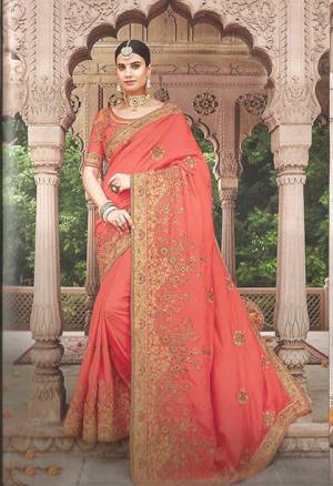 Look Beautiful In This Very Beautiful Designer Saree In Crimson Red Color. This Elegant Saree And Blouse Are Silk Based Beautified With Pretty Embroidery. 