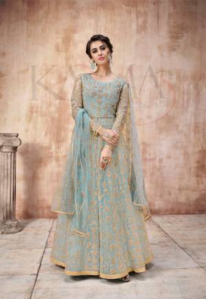 Add This Very Pretty Heavy Designer Floor Length Suit To Your Wardrobe In All Over Sky Blue Color. Its Heavy Embroidered Top IS Fabricated On Net Paired With Satin Silk Bottom And Net Fabricated Dupatta. It Is Light In Weight And Easy To Carry Throughout The Gala. Buy Now.