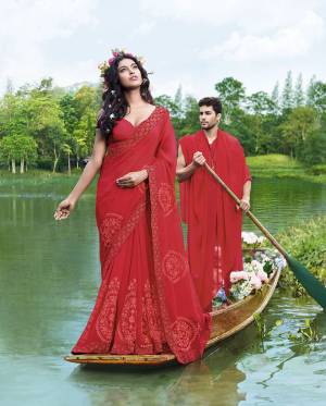 Grab This Very Beautiful And Elegant Looking Designer Saree In Red Color Paired With Red Colored Blouse. This Saree Is Fabricated On Georgette Paired With Art Silk Fabricated Blouse. This Saree Is Light In Weight And Easy To Carry All Day Long. 