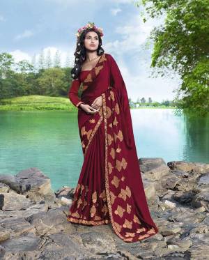 Grab This Very Beautiful And Elegant Looking Designer Saree In Maroon Color Paired With Maroon Colored Blouse. This Saree Is Fabricated On Georgette Paired With Art Silk Fabricated Blouse. This Saree Is Light In Weight And Easy To Carry All Day Long. 