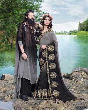 You Will Definitely Earn Lots Of Compliments Wearing This Rich Looking Designer Saree In Grey And Black Color Paired With Black Colored Blouse. This Embroidered Saree Is Georgette Based Paired With Art Silk Fabricated Blouse. 