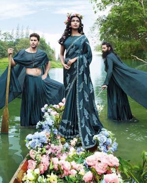 You Will Definitely Earn Lots Of Compliments Wearing This Rich Looking Designer Saree In Blue Color Paired With Blue Colored Blouse. This Embroidered Saree Is Silk Georgette Based Paired With Art Silk Fabricated Blouse. 
