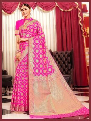 Celebrate This Festive Season A Proper Traditional Wear With This Saree In Fuschia Pink Color Paired With Fuschia Pink Colored Blouse. This Saree And Blouse Are Silk Based Which Gives A Rich Look To Your Personality. 
