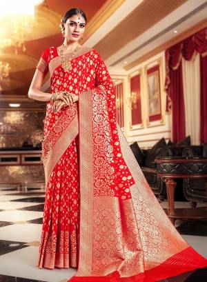Celebrate This Festive Season A Proper Traditional Wear With This Saree In Red Color Paired With Red Colored Blouse. This Saree And Blouse Are Silk Based Which Gives A Rich Look To Your Personality. 