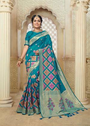 Celebrate This Festive Season With Beauty And Comfort Wearing This Pretty Silk Based Saree In Blue Color Paired With Blue Colored Blouse. This Saree And Blouse Are Fabricated On Banarasi Art Silk Beautified With Weave All Over. 