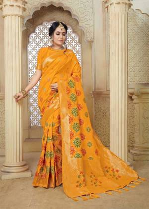 Celebrate This Festive Season With Beauty And Comfort Wearing This Pretty Silk Based Saree In Musturd Yellow Color Paired With Musturd Yellow Colored Blouse. This Saree And Blouse Are Fabricated On Banarasi Art Silk Beautified With Weave All Over. 