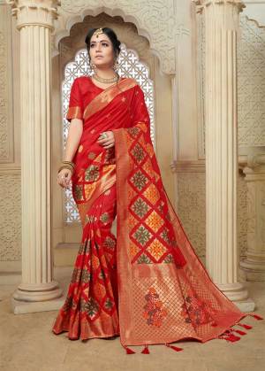 Celebrate This Festive Season With Beauty And Comfort Wearing This Pretty Silk Based Saree In Red Color Paired With Red Colored Blouse. This Saree And Blouse Are Fabricated On Banarasi Art Silk Beautified With Weave All Over. 
