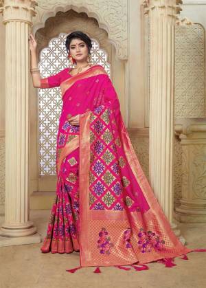Celebrate This Festive Season With Beauty And Comfort Wearing This Pretty Silk Based Saree In Dark Pink Color Paired With Dark Pink Colored Blouse. This Saree And Blouse Are Fabricated On Banarasi Art Silk Beautified With Weave All Over. 