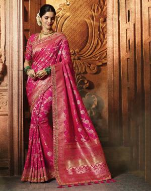 Bright And Visually Appealing Saree Is Here With This Heavy Designer Saree In Rani Pink Color. This Pretty Heavy Weaved And Embroidered Saree Are Silk Based Which also Gives A Rich Look To Your Personality. 