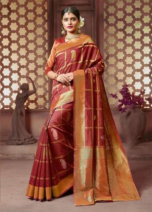 You Will Definitely Earn Lots Of Compliments In Traditional Look Wearing This Beautiful Silk Based Saree In Maroon And Rust Color. This Saree IS Light Weigh, Durable And Easy To Carry All Day Long. 