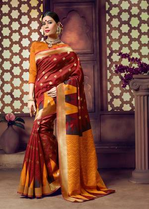 You Will Definitely Earn Lots Of Compliments In Traditional Look Wearing This Beautiful Silk Based Saree In Maroon And Orange Color. This Saree IS Light Weigh, Durable And Easy To Carry All Day Long. 