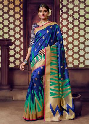 Celebrate This Festive Season With Beauty And Comfort In This Light Weight Silk Based Saree In Royal Blue And Blue Color. This Pretty Weaved Saree And Blouse Are Fabricated On Art Silk Which Gives A Rich Look To Your Personality. 