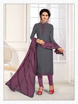 If Those Readymade Suit Does Not Lend You The Desired Comfort, Than Grab This Pretty Dress Material In Grey And Purple And Get This Stitched As Per Your Desired Fit And Comfort. Its Top Is Fabricated On Cotton Slub Paired With Cotton Bottom And Chiffon Fabricated Dupatta. 