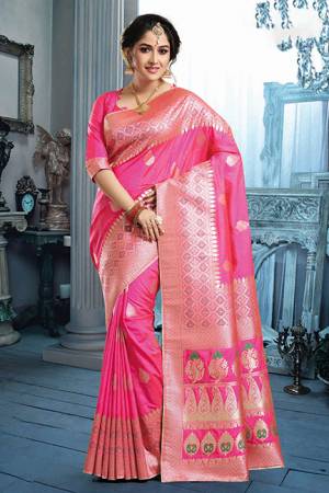 Shine Bright In This Lovely Rani Pink Colored Saree Paired With Rani Pink Colored Blouse. This Saree And Blouse are Fabricated On Art Silk Beautified With Weave. 