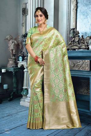 Elegant And Rich Looking Heavy Weaved Designer Saree Is Here In Light Green Color . This Saree And Blouse Are Fabricated On Art Silk Which Is Light Weight, Durable and Easy To Care For .