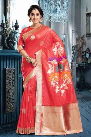Celebrate This Festive Season Wearing This Pretty Sillk Based Saree In Crimson Red Color Paired With Crimson Red Colored Blouse. This Saree And Blouse Are Fabricated On Art Silk Beautified With Weave All Over. 