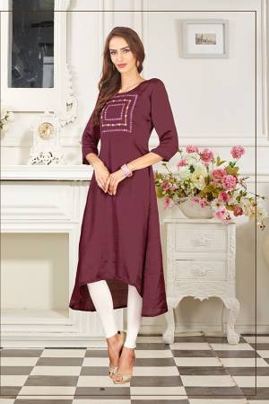 Add This Lovely Color To Your Wardrobe In Wine Colored Readymade Kurti Fabricated On Soft Satin Silk. Its Fabric Is Soft Towards Skin And Easy To Carry All Day Long. 