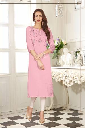 Look Pretty In This Readymade Straight Kurti In Light Pink Color. It Is Fabricated On Soft Satin Silk Beautified With Thread Work. 