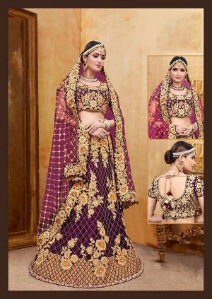 Get Ready For Your D-Day With This Heavy Designer Bridal Lehenga?Choli In Purple Color Paired With Purple Colored Dupatta. Its Heavy Embroidered Blouse And Lehenga Are Fabricated On Velvet Paired With Net Fabricated Dupatta