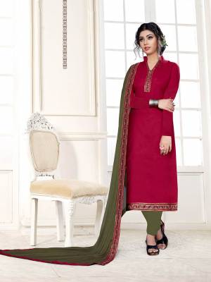 Celebrate This Festive Season With Beauty And Comfort Wearing This Designer Suit In Dark Pink Color Paired With Contrasting Olive Green Colored Bottom And Dupatta. This Dress Material Is Cotton Based Paired With Chiffon Fabricated Dupatta. 