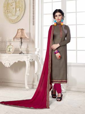 If Those Readymade Suit Does Not Lend You The Desired Comfort Than Grab This Cotton based Dress Material With Chiffon Dupatta And Get This Stitched As Per Your Desired Fit And Comfort. Its Top IS In Sand Grey Color Paired With Contrasting Magenta Pink Colored Bottom and Dupatta. Buy Now.